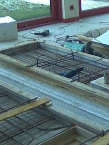 Installation of industrial flooring and concrete elements, Loft-style cottage