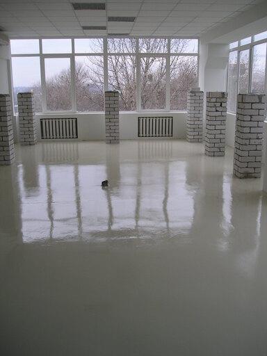 Installation of a colorful epoxy floor in the office on Serpova Street
